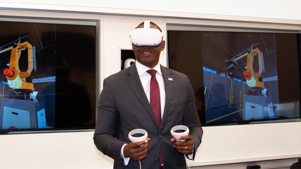 Mr. Chike Aguh, Chief Innovation Officer at the U.S. Department of Labor, tries the ARM Institute's VR Robotics Technician Assessment