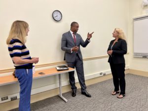 ARM Institute Chief Workforce Officer Lisa Masciantonio and ARM Institute Certification Manager Mary Ellen Rich speak with Mr. Chike Aguh