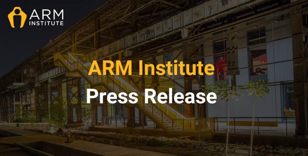 The ARM Institute Mill 19 facility sits behind text that says "ARM Institute Press Release"