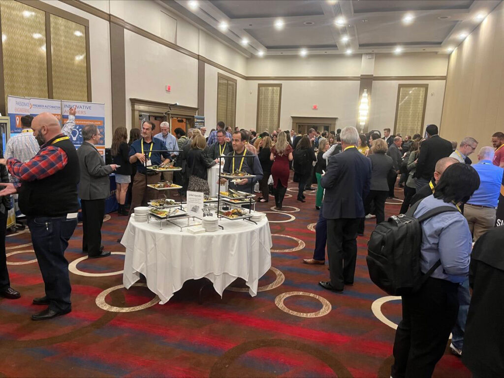 Attendees network at Annual Meeting