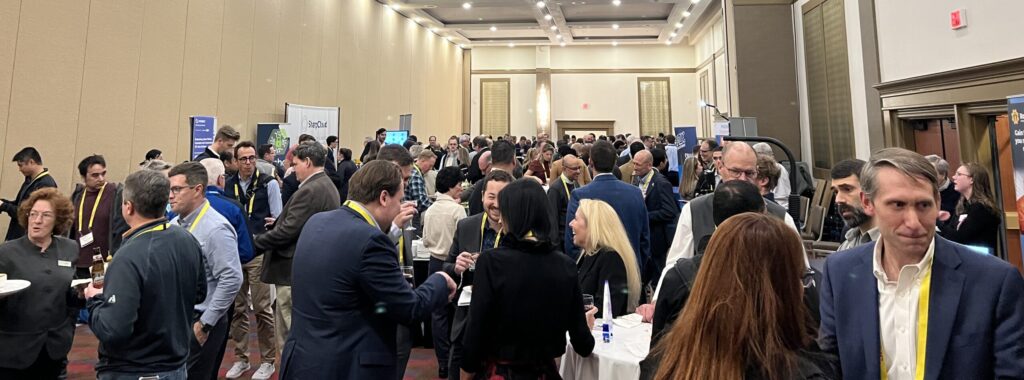 Image showing individuals at the 2023 Member Meeting Member Showcase Tables