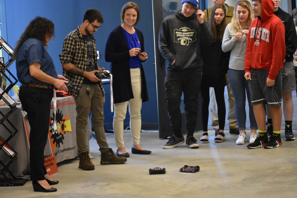 Michel Conklin interacts with students at the ARM Institute's Manufacturing Day event in 2019