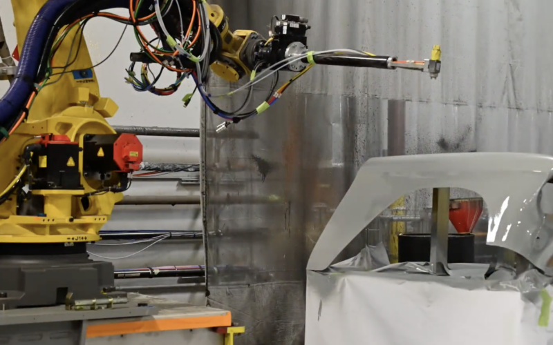 A robot works on an aircraft part
