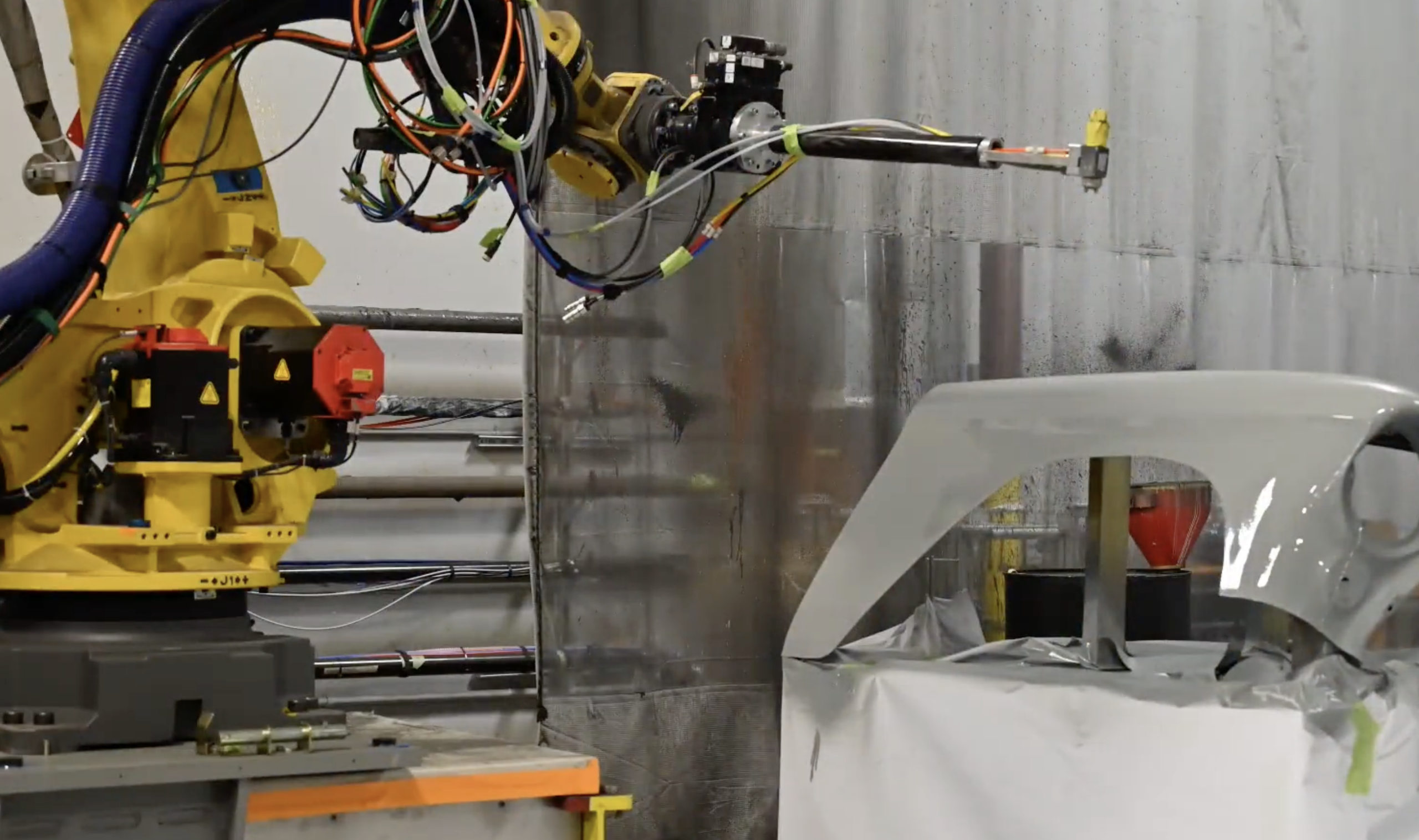 A robot works on an aircraft part